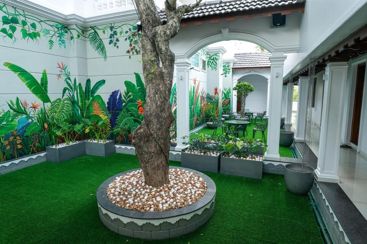 Hotel Heritage Plaza Kottayam Esterno foto