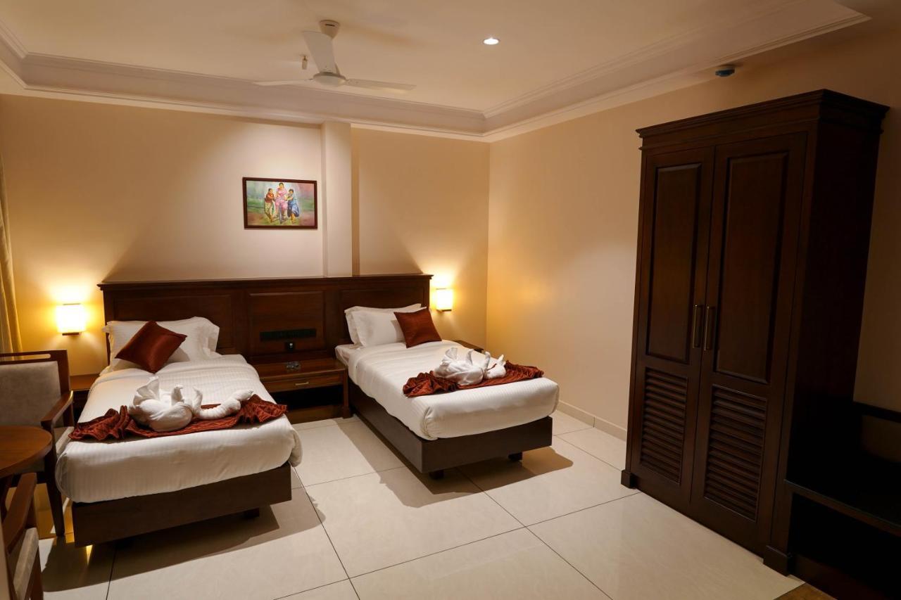 Hotel Heritage Plaza Kottayam Esterno foto